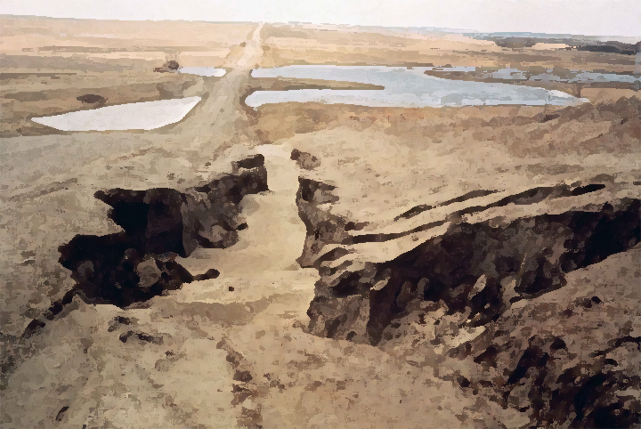 A picture of a landscape featuring a channel that has been formed from erosion, leading toward a series of small lakes. 